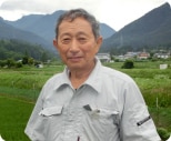 生産者：山嵜善平さんの顔写真