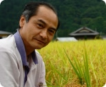 生産者：トキ・龍の瞳生産組合の方の顔写真