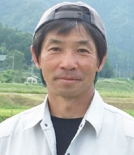 生産者 高見康彦さんの顔写真