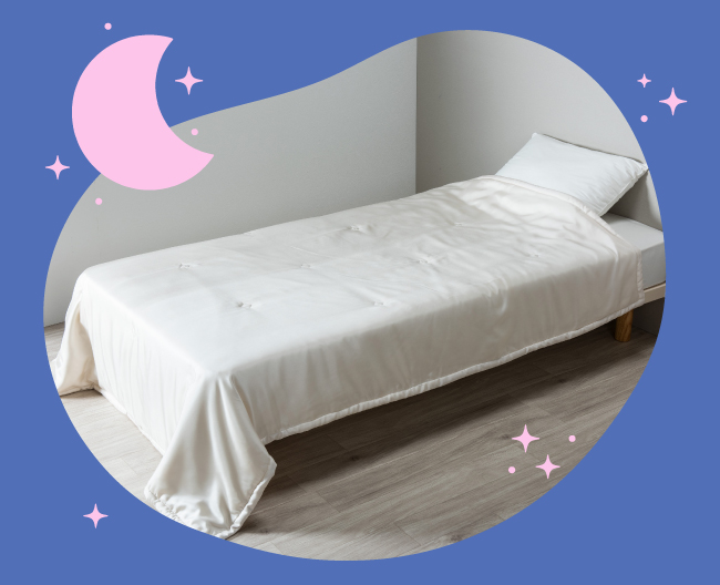 上品なアイボリーのシルク使用の掛ふとんの写真