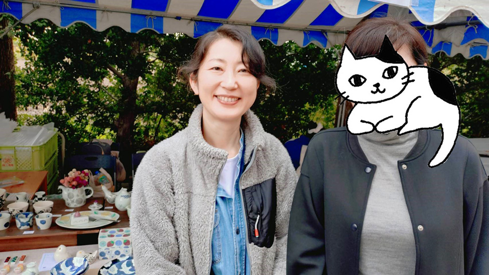 Tさんと鈴木陽子先生が並んで笑顔を見せる記念写真