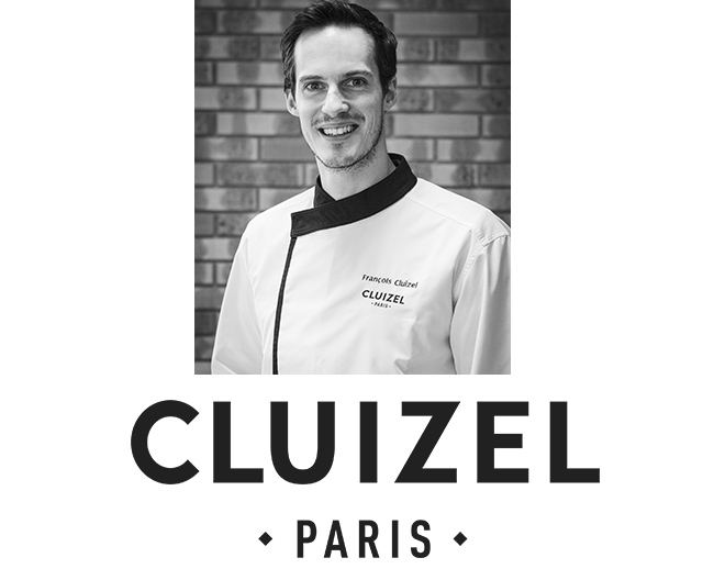 フランソワ・クルイゼル氏とクルイゼルのロゴの写真