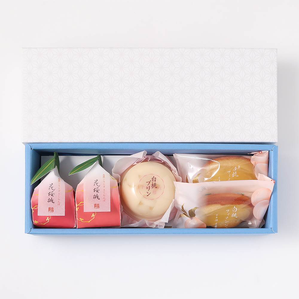 宗家 源 吉兆庵〉白桃フィナンシェ 12個入 | さいか屋 Web